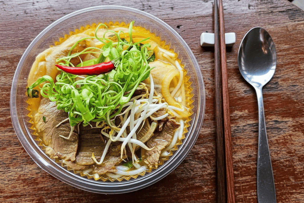Bun Bo Hue 14B has become famous for being the only beef noodle soup eatery in Saigon, awarded the Bib Gourmand